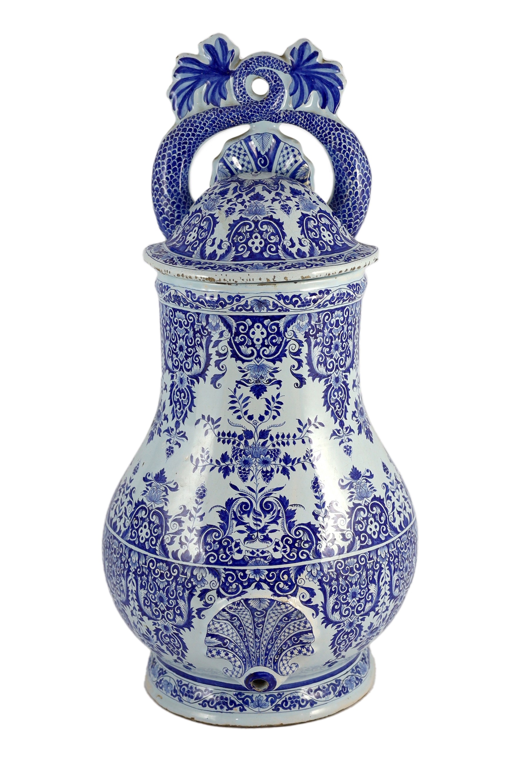 A large Rouen faience blue and white cistern, second quarter 18th century, 57.5cms high 57.5cm high, restorations